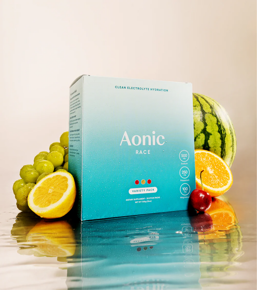 Aonic Race hydration sticks with water and training gear
